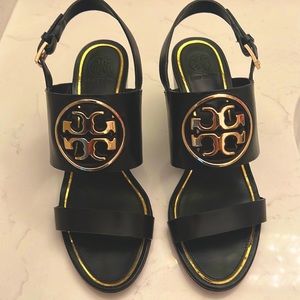 Tory Burch black wedge sandal.  2 1/2 inch heal.  Wore once